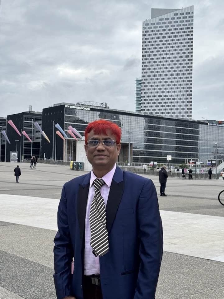 Dr. Md. Shariful Islam outside an international conference venue